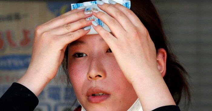 Mulher com rosto vermelho